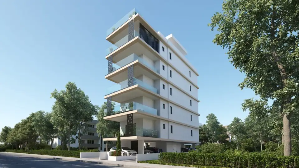 Render of a slender six-storey white block with continuous balconies and mature trees alongside