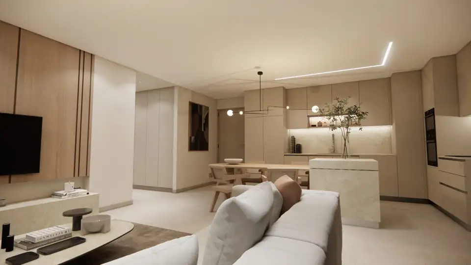 Living space from behind the sofa, TV wall and dining table beyond