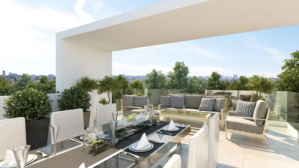Roof terrace render with laid dining table, lounge seating, planters and rooftop views over Larnaca