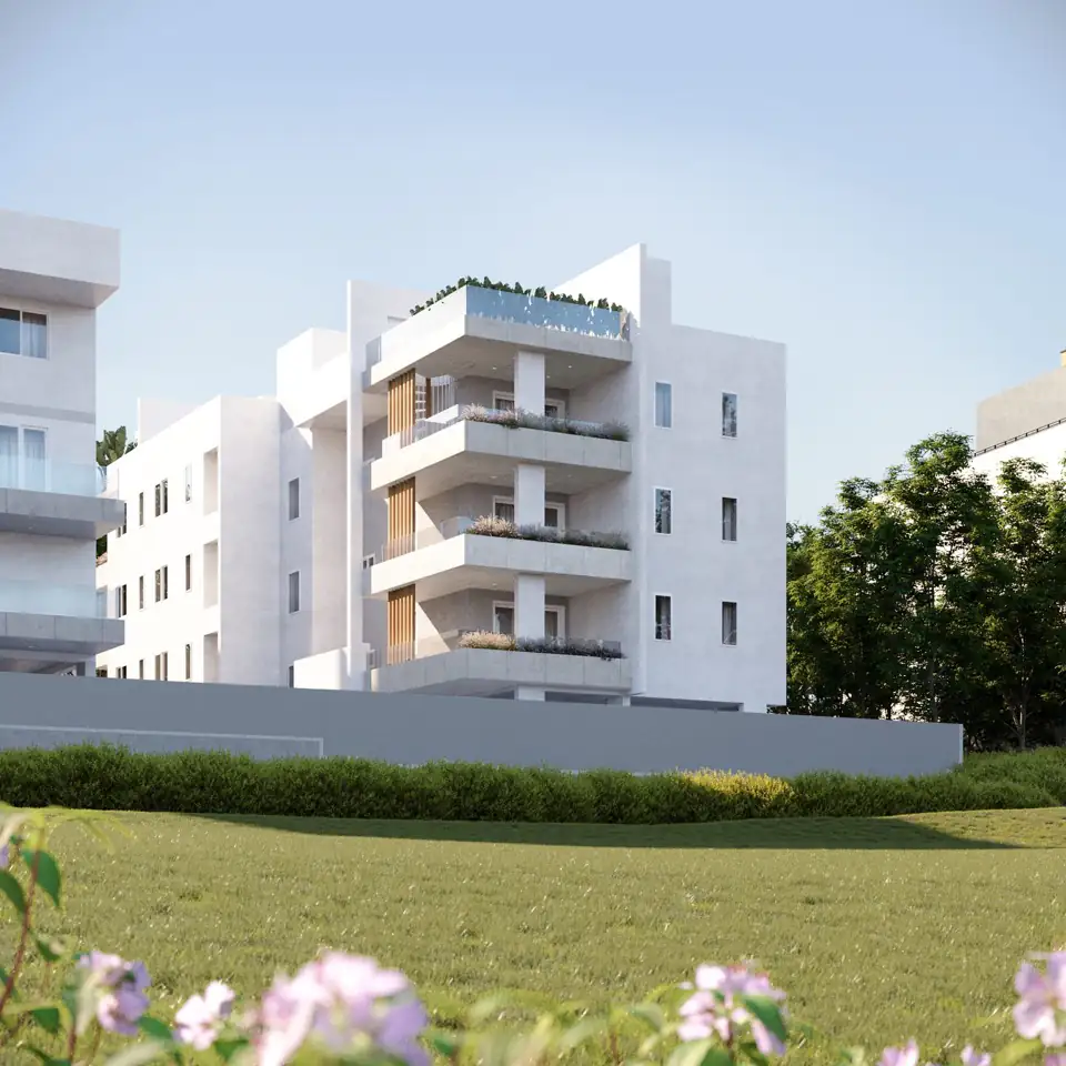 Render of the side elevation seen across a lawn, stacked balconies and roof-terrace planting